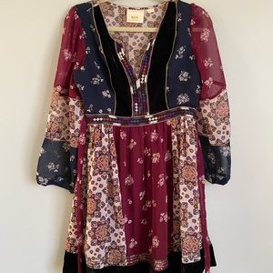 Anthropologie dress with fun pattern and tie in back
